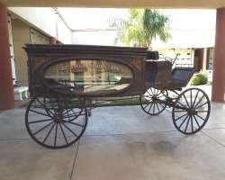 The 19th-century horse-drawn hearse is displayed in the Mortuary.